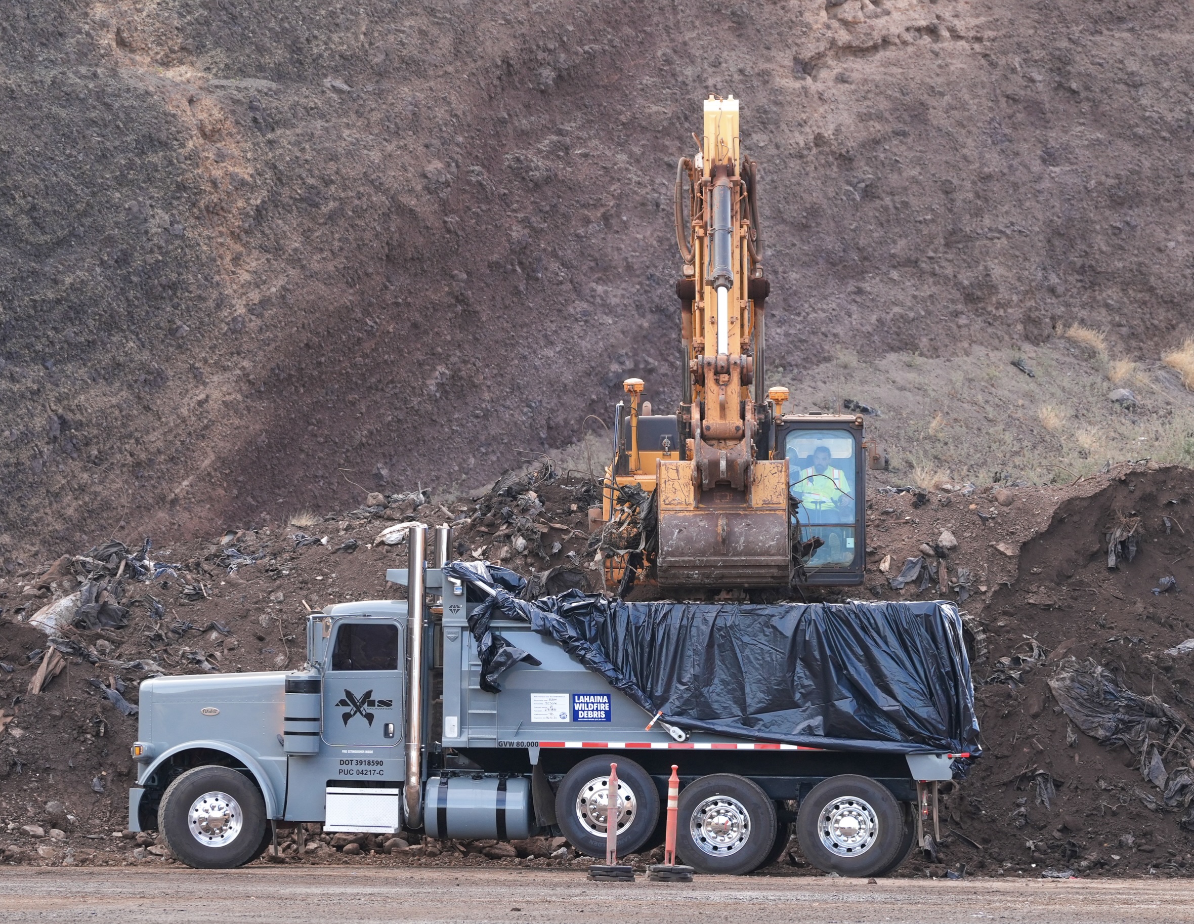 State, county monitor air quality fire during debris transfer